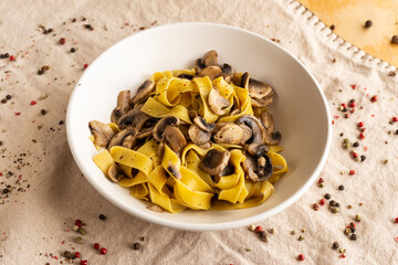 Tagliatelle with mushrooms, typical italian food
