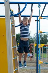 a boy plays on the Playground. playground.