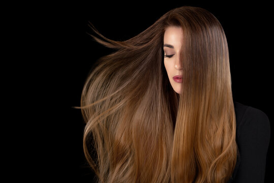 Healthy long hair. Beautiful model girl with shiny straight hair. Hair care and spa treatments