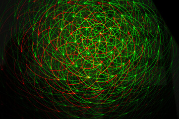 Lasers produce a narrow beam of light in which all of the light waves have very similar wavelength. Laser beam can travel very long distances. Laser light forms a beautiful texture pattern background.