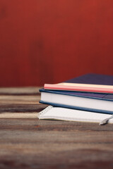 books notepads pens on wooden table pencil office writing