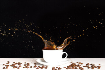 cup of coffee and coffee splash