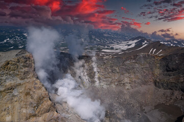 Panoramic view of the city Petropavlovsk-Kamchatsky and volcanoes: Koryaksky Volcano, Avacha Volcano, Kozelsky Volcano. Russian Far East, Kamchatka Peninsula.