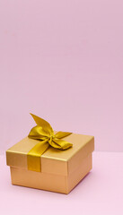 boxes for presentations of different colors on a pink background. Festive backdrop for holidays: Birthday, Valentines day, Christmas, New Year.