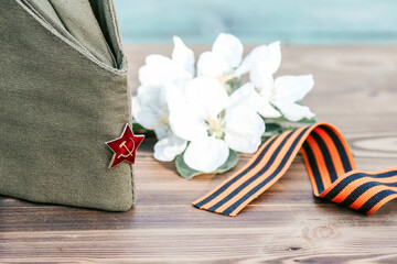 9 may holiday victory day. George ribbon and military cap.