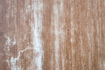 Old brown wooden background with white dye scratch. Real wood texture. Hipster wallpaper.