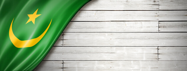 Mauritania flag on old white wall banner