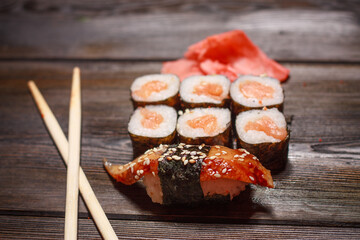 asian cuisine sushi rolls wooden sticks wasabi ginger seafood