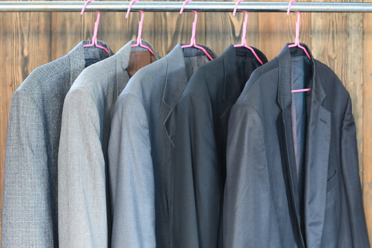 Set Of Business Suit Jackets On A Hanger