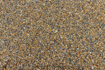 Chipped natural stone. Crushed stone from granite. Macro photo of rubble with place for text