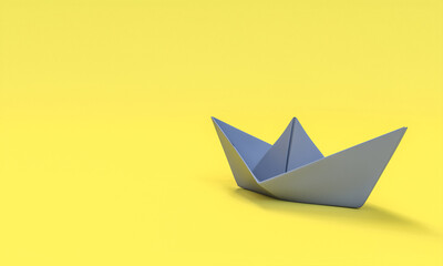 gray paper boat on yellow background.