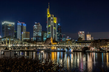 The skyline of Frankfurt at night at a cold day in winter.