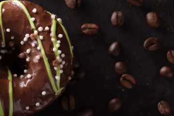 Chocolate cake Doughnuts with icing sugar on dark background