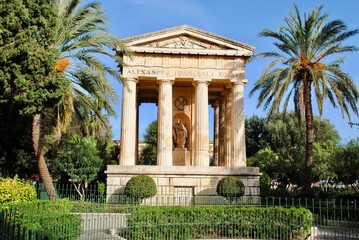 Fototapeta na wymiar Lower Barrakka Gardens, Valletta,Malta. A neoclassical monument erected in 1810 in the form of a Roman temple, to Sir Alexander Ball, a leader of the Maltese insurgents in the 1798 uprising.