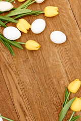 flowers Easter eggs decoration wooden background Copy Space