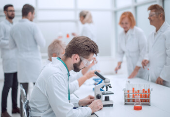 Fototapeta premium scientist conducting blood analysis in the laboratory .