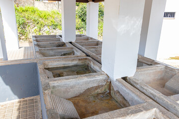 Old public laundry or washing place in the village of Santa Ana la Real in Huelva mountains, Sierra de Aracena, Spain