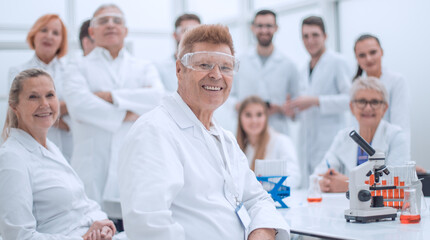 portrait of a successful supervisor and his team in the laboratory .