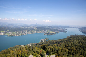 Panoramic top view of the green Austrian Alps, Maria Wörth and Werthersee lake