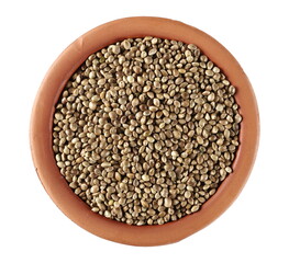 Hemp seeds in clay pot isolated on white background, top view