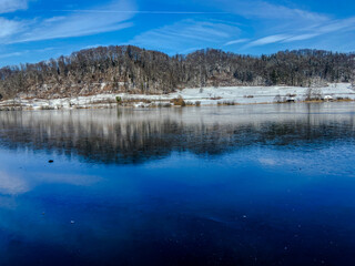 A black frozen lake