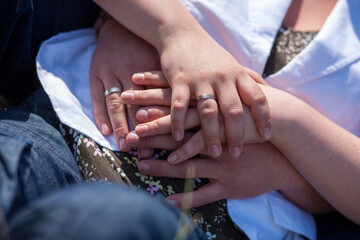 Loving couple holding hands close-up. Love concept. High quality photo