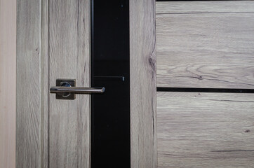 The gray door to the room.