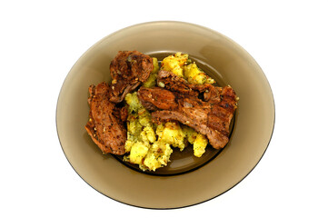 Grilled turkey fillet with fried potatoes.