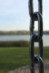 chain on the background of the lake