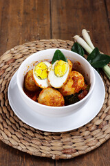Telur bumbu Bali is Indonesian traditional food from Bali made from boiled egg with spicy sauce.