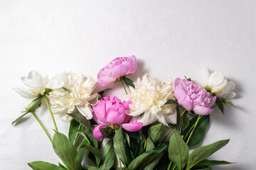 Bouquet of pink and white peony flowers on white background. Holidays concept, Mothers day, greeting card. Spring, flowering, summer flowers. Copy space