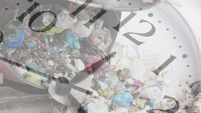 Clock moving fast over lorry in rubbish disposal site