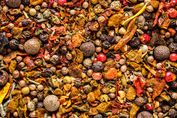 A mixture of different spices close up. Textures of colorful spices and condiments.Colorful Herbal and Spices Oriental.Cafe concept.Various Indian spices