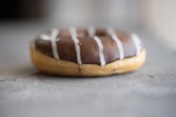 donuts yellow and chocolate Grey background