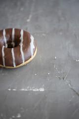 donuts yellow and chocolate Grey background
