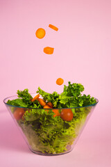 green lettuce salad with tomato and carrot
