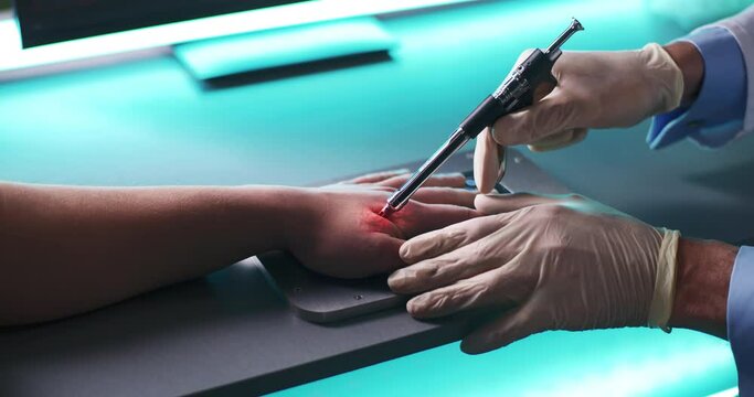Doctor and patient during RFID chip implantation