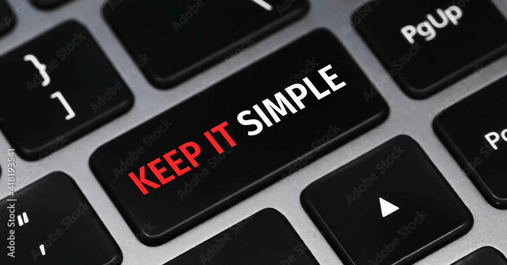 Wall mural written word keep it simple on keyboard button