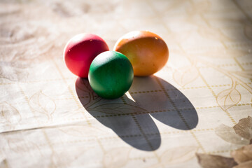 Colored eggs on a table top