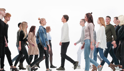 Fototapeta na wymiar diverse young people walking in different directions.