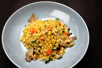 hot rice with pork on a black background