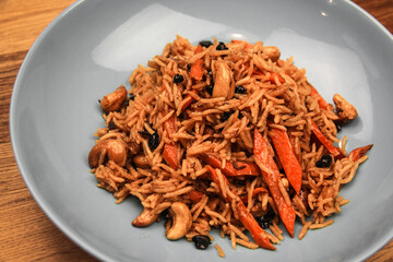 hot rice with pork on a black background