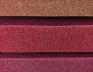 Fototapeta premium foam material background in square shape arranged in brown, pink, purple colorful effect.