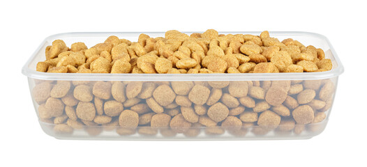 Dry cat food in open transparent plastic container without lid isolated on white background