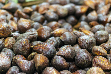 close up view of a pile of black and white peppercorns