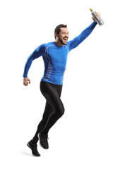 Fototapeta premium Full length shot of a fit man in sportswear running and holding a bottle with drink