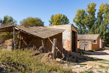 rural huts to protect hay and a warehouse