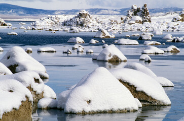 North America, USA, California, Mono Lake. Tufa formation covered with snow