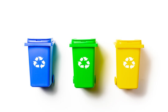 Recycling bins. Yellow, green, blue dustbin for recycle plastic, paper and glass can trash isolated on white background. Container for disposal garbage waste and save environment.