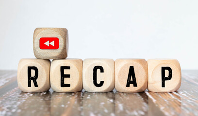 Word RECAP on wooden block